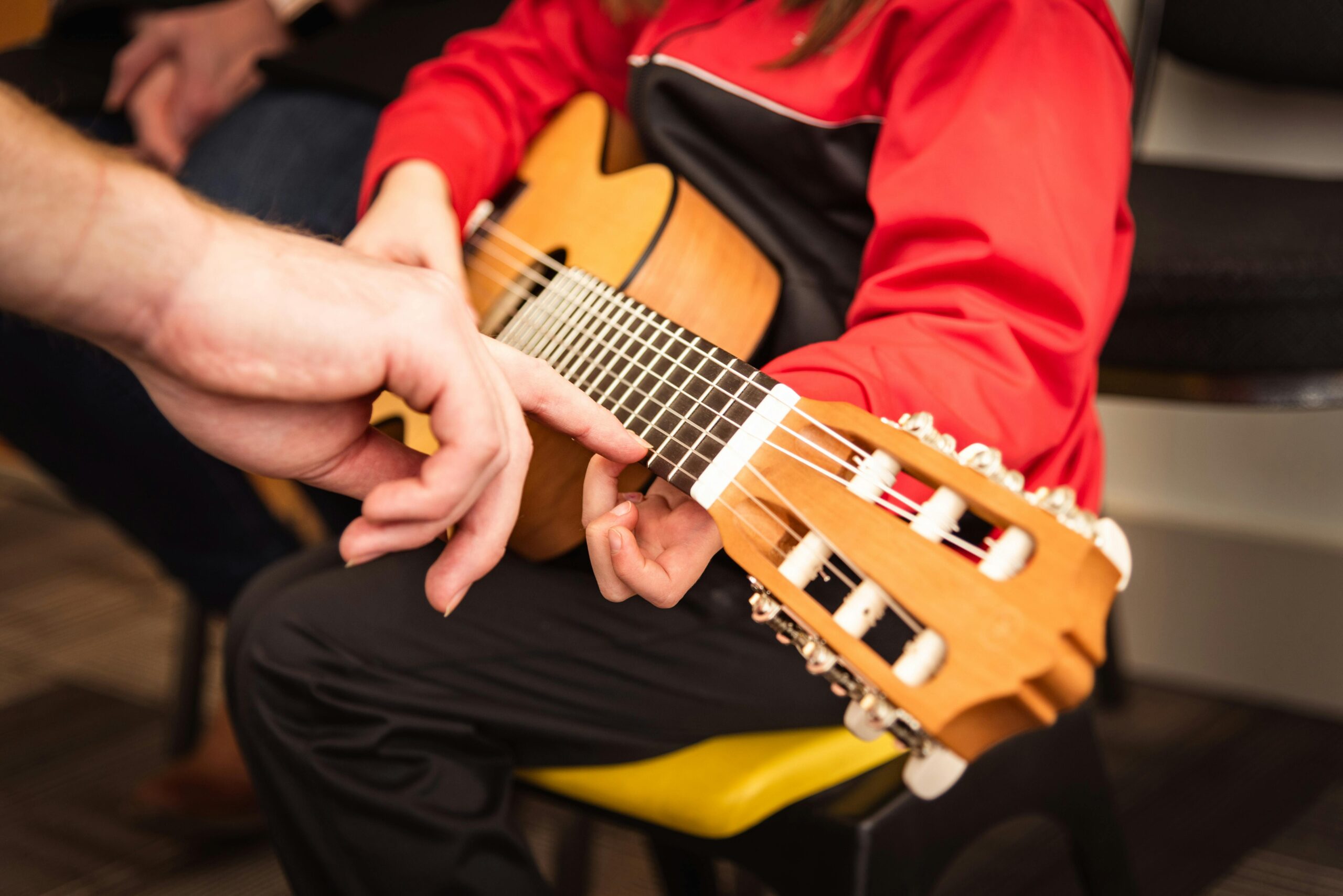 Child Playing the Guitar