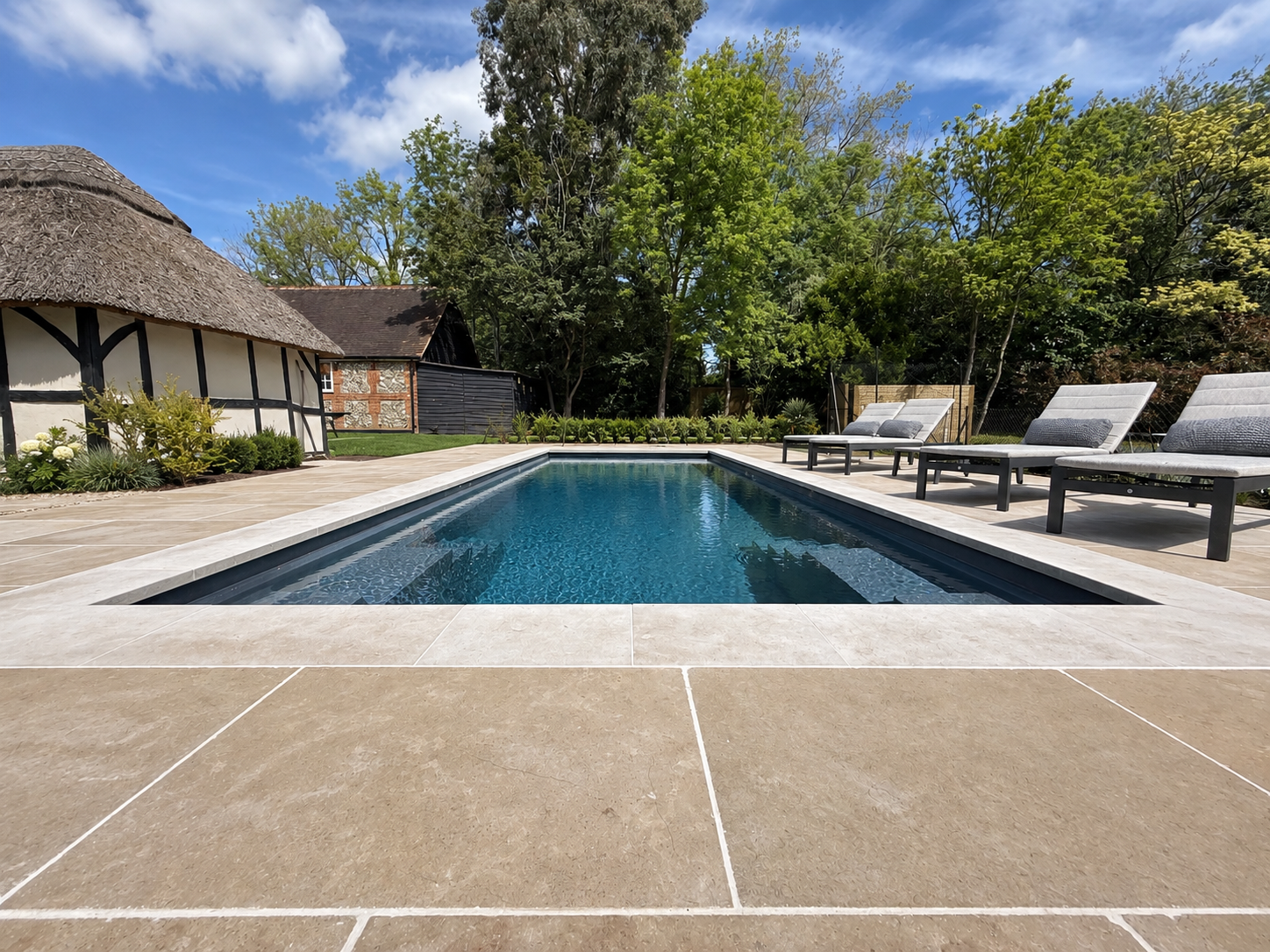 The Barber Project by HiLife Pools, a one-piece pool with sandstone patio entered into the UK Pool & Spa Awards 2026